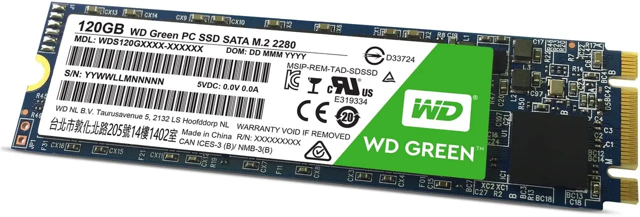 WD Green SSD M.2 V1 120GB angled top view showing the green label, circuit board, and gold connector pins