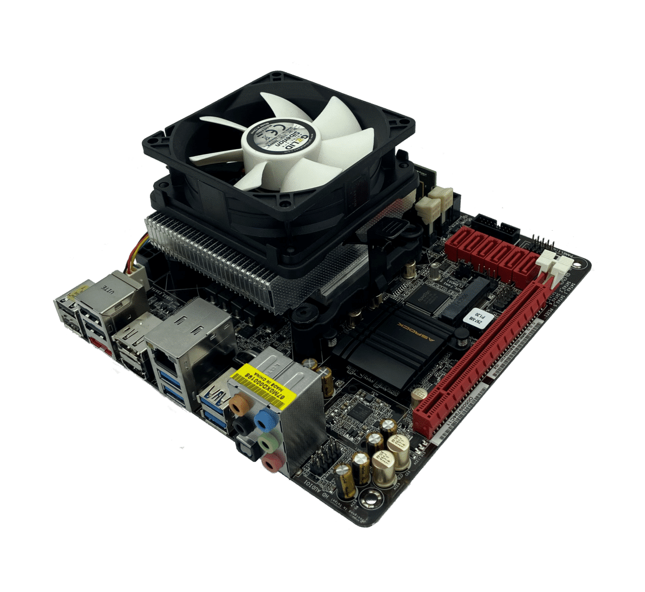 Upgrade: Z87-M8 ITX - i5 4460 - 8GB motherboard with mounted CPU cooler, angled top-down view showing the motherboard layout, red power delivery section, audio connectors, and rear I/O ports