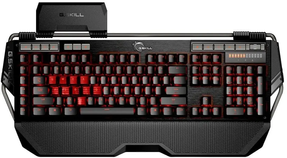 G.Skill Ripjaws KM780 Mechanical keyboard front view with Cherry MX Red switches and Qwertz DE layout, featuring black and red keycaps, wrist rest, and detachable top panel against white background