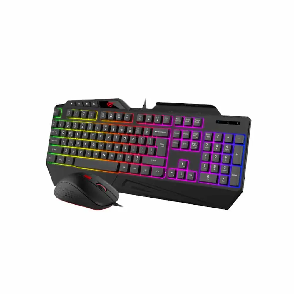 G.Skill Ripjaws KM780 Mechanical Gaming Keyboard with Cherry MX Red Switches and matching gaming mouse, front view showing RGB rainbow lighting in green, yellow, pink, purple and blue zones, with wrist rest and detached black gaming mouse displayed in front.