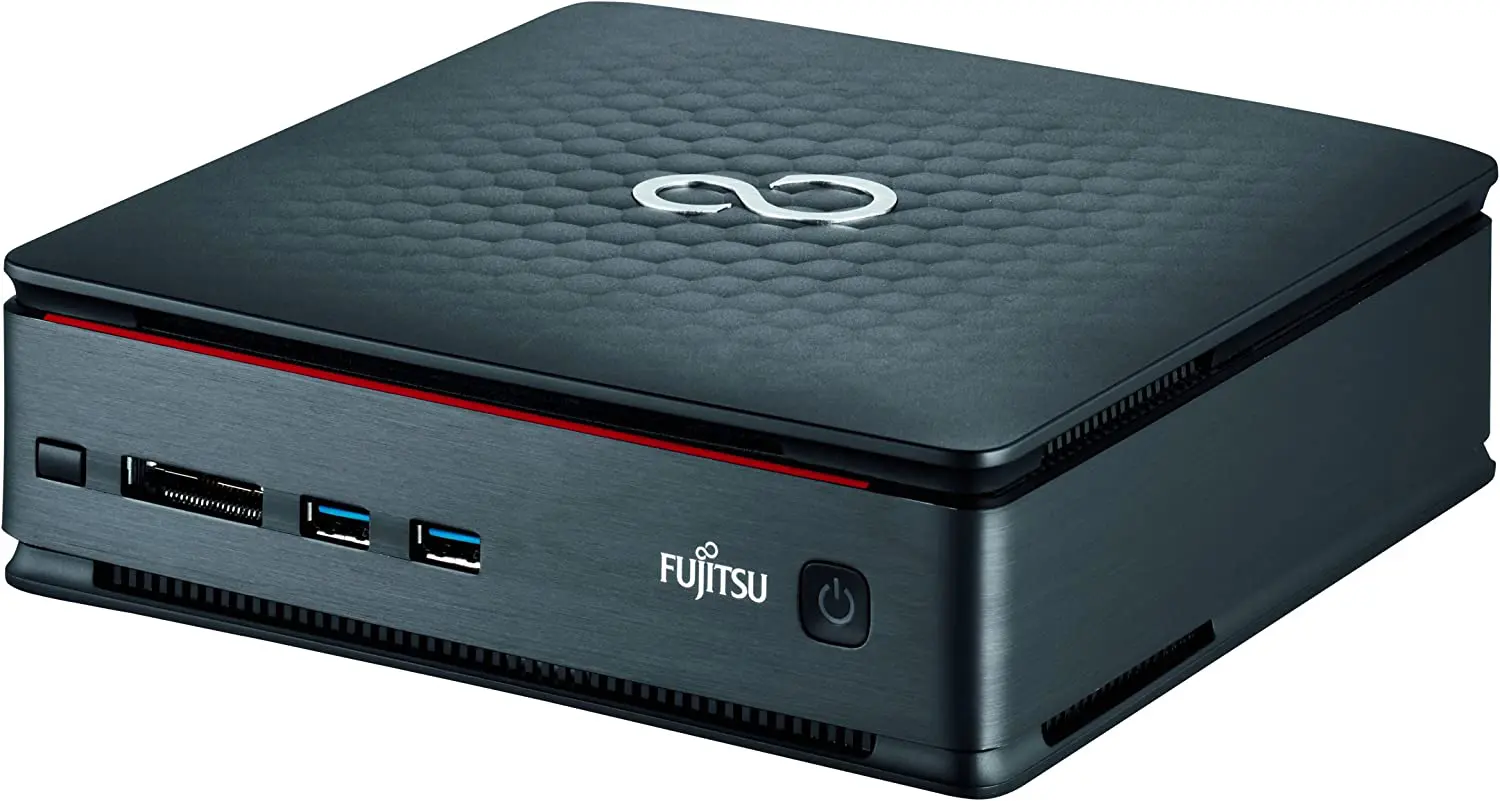 Fujitsu Esprimo Q520 compact desktop computer shown from front angle displaying power button, USB ports, and Fujitsu branding