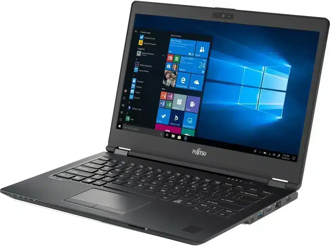 Fujitsu Lifebook U749 laptop shown from front-left angle with screen open displaying Windows 11 Start menu and desktop, black chassis with 14-inch display, keyboard visible, and ports on sides