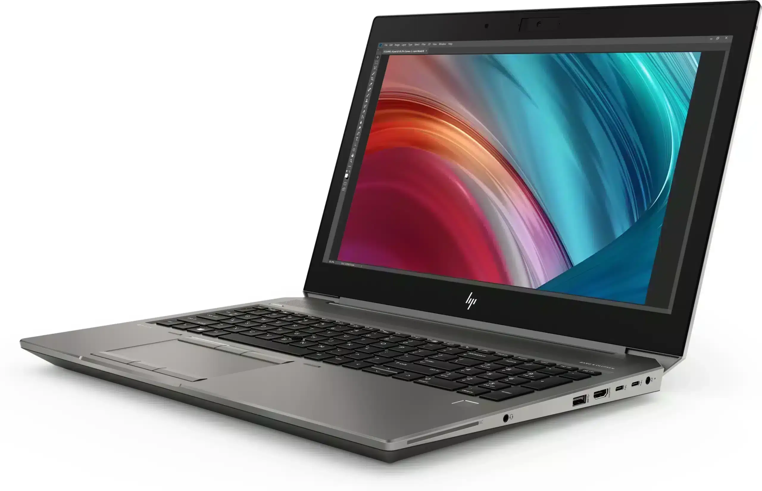 HP Zbook 15 G6 laptop angled front-left view showing 15.6-inch display with colorful gradient wallpaper, black keyboard, gray aluminum chassis, and right-side ports